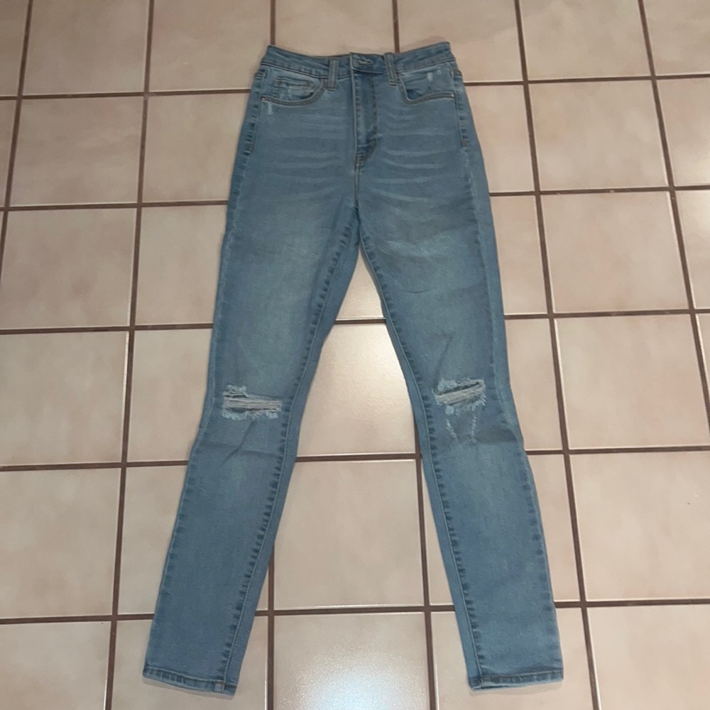 High rise light denim ripped skinny jeans